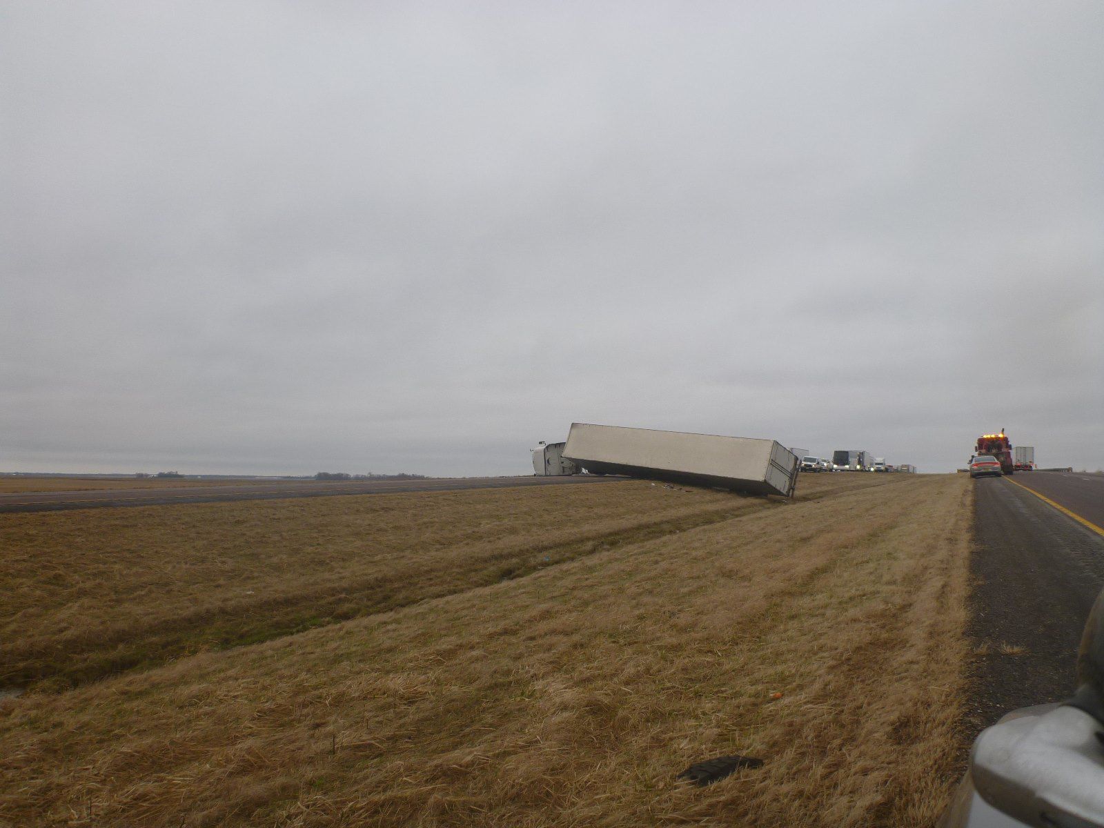 Iowa State Patrol over turned semi photo
